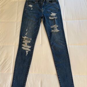 Woman’s Distressed American Eagle Blue Jeans